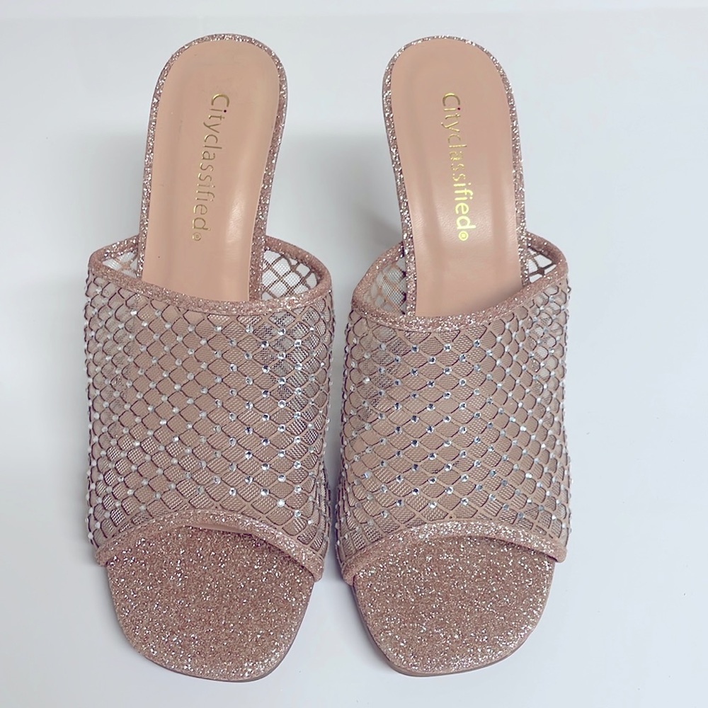 Golden sparkly shoes with diamonds. Size 8 1/2 shoes. Never worn